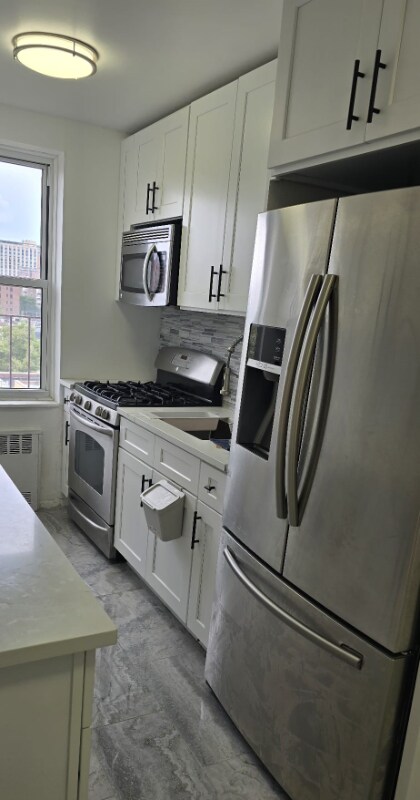 Foto del edificio - 105-38-105-64 64th Rd