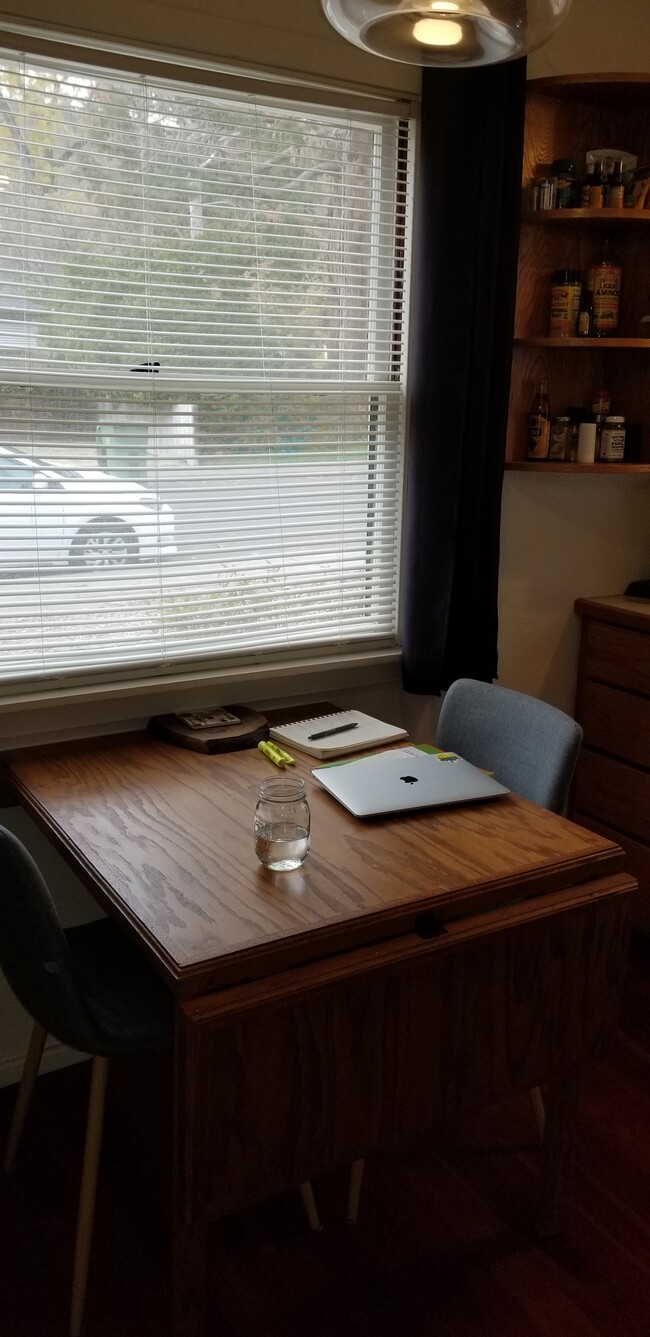 Kitchen table built into the wall with extension - 409 McPeak St