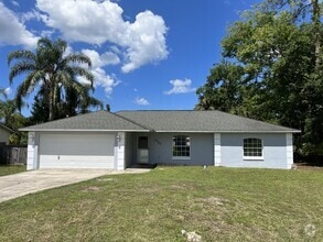 Building Photo - 3323 Umbrella Tree Dr