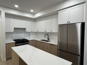 Building Photo - 19911-19976 76 Ave