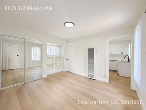 Building Photo - 6614 1/2 S Menlo Ave