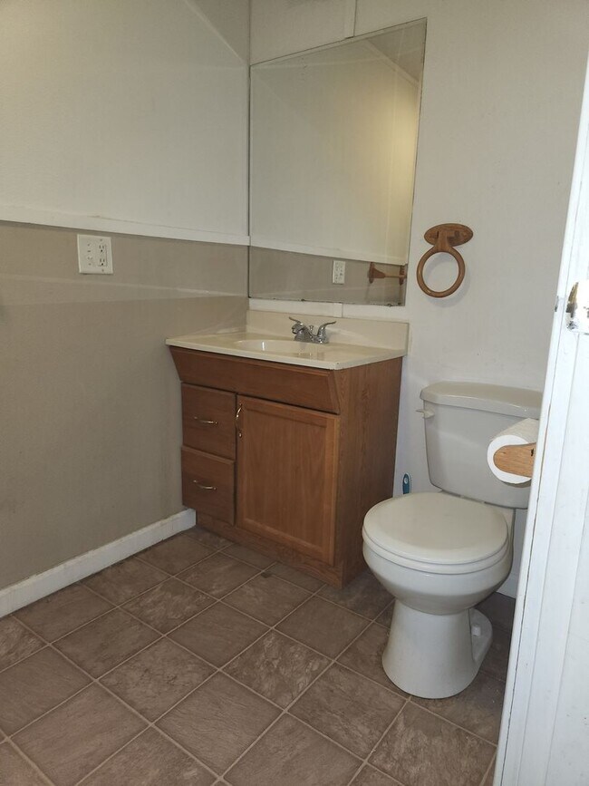 Building Photo - Three Bedroom, One Bathroom Duplex Apartment