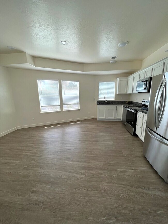 Building Photo - Hurry—Deposit Moves You In! | Modern 3-Bedroom Townhome with a 2-Car Garage & Private Balcony in ...