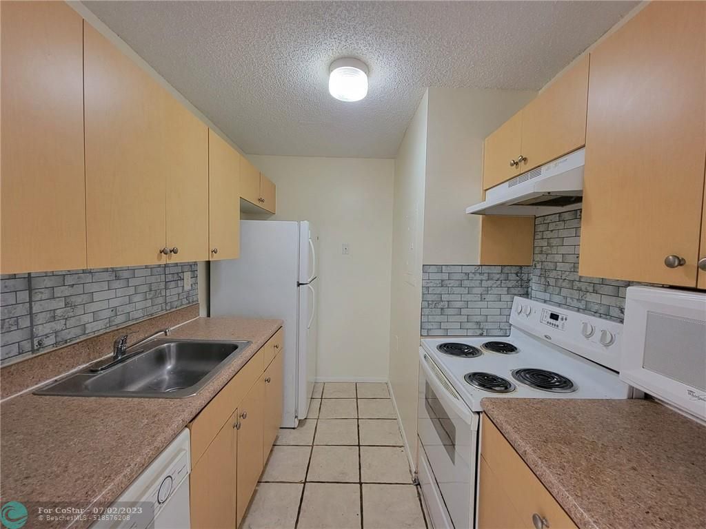 1101 Benoist Farms Rd Unit 106, West Palm Beach, FL 33411 Condo for