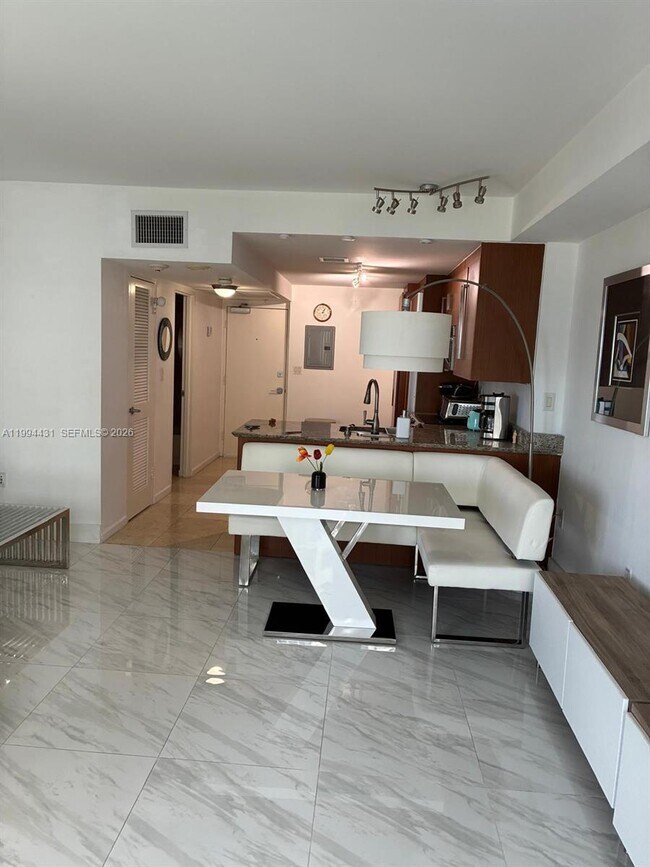 Building Photo - 10275 Collins Ave