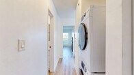 Located at 20 29th Ave in the sought-after Venice neighborhood of Los Angeles, this well-appointed 1-bedroom, 1-bathroom residence offers a thoughtfully designed single-level layout. Light-toned hardwood flooring flows consistently throughout, lending warmth and cohesion to every room.

The open-plan living room and kitchen area serves as the heart of the space. The living room is bathed in natural light from large windows and sliding glass doors that open onto a private balcony, revealing charming views of the surrounding Venice neighborhood, including lush greenery and iconic palm trees. A sleek, modern fireplace with a concrete surround adds a striking focal point. A ceiling fan provides additional comfort.

The kitchen features crisp white cabinetry, light quartz countertops, and a full suite of stainless steel appliances, including a French door refrigerator, range, and dishwasher — combining style with functionality.

The bedroom is a calm, well-lit retreat with a ceiling fan, a natural light-admitting window, and a mirrored sliding-door closet that enhances the sense of space. The bathroom is finished with large-format marble-look tile in the tub/shower surround, warm wood-tone flooring, and clean white vanity cabinetry, creating a bright and refined atmosphere.