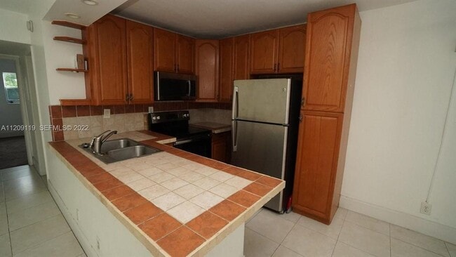 Building Photo - 1150 NW 30th Ct