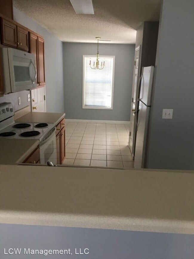 Foto del edificio - 5845 Regent Village Dr