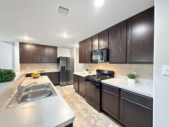 Foto del edificio - 3003 Silverhorn Ln
