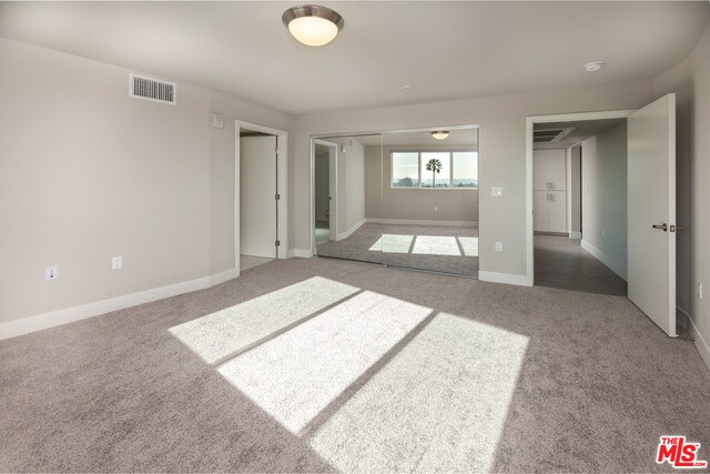 Building Photo - 5210 W Olympic Blvd