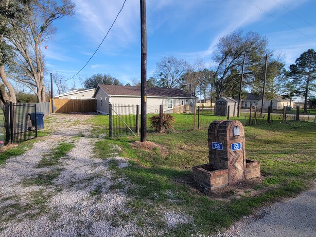 Gated driveway on a corner lot - 258 Rosewood St