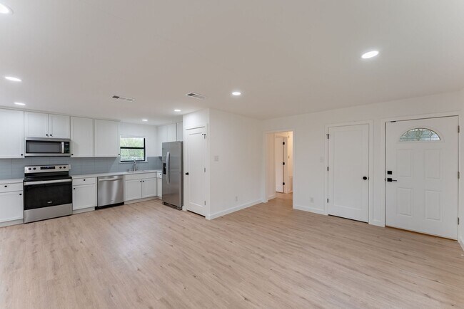 Building Photo - Discover Elevated Living: A Meticulously R...