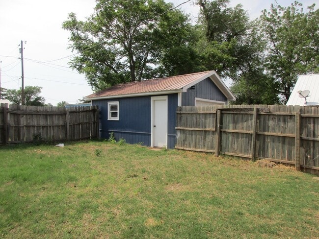 Foto del edificio - Cute Bungalow with a screened in front porch