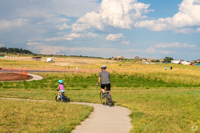 Everyone enjoys biking on the paved trails of Wolf Ranch.