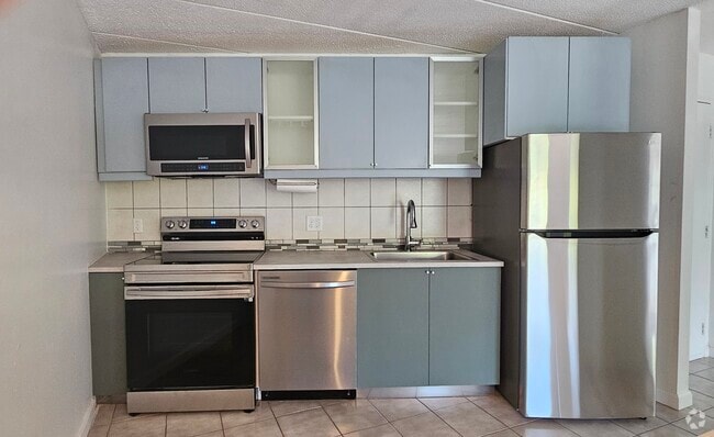 Plenty of cabinets and new stainless steel appliances - 147 Turner Rd