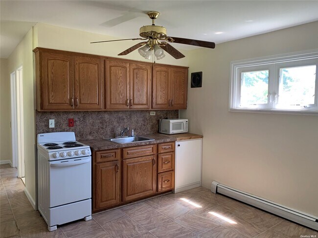 Foto del edificio - 32 Boxwood Ln