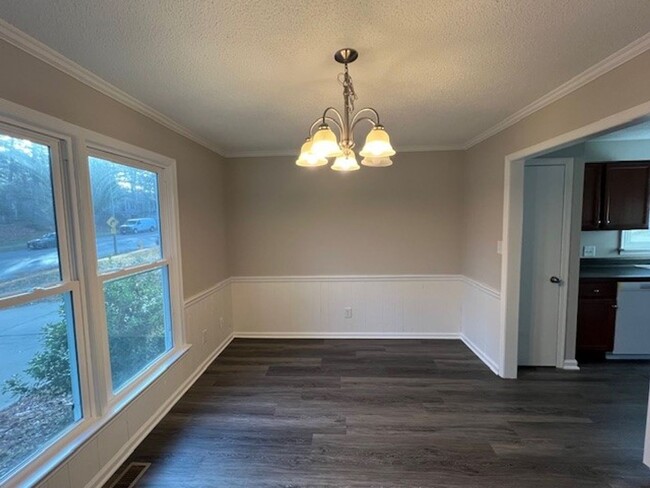 Building Photo - Beautiful Townhome with New LVP Floors and...