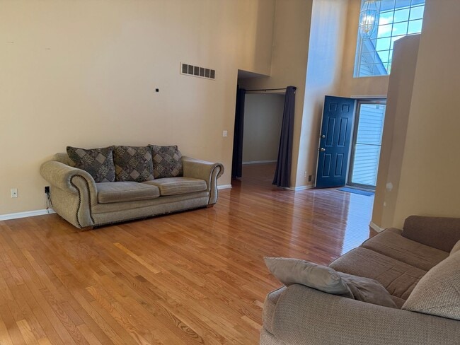 Building Photo - Large 2 Story home with 3 Bedrooms, 2.5 baths, hardwood floors, office and finished basement