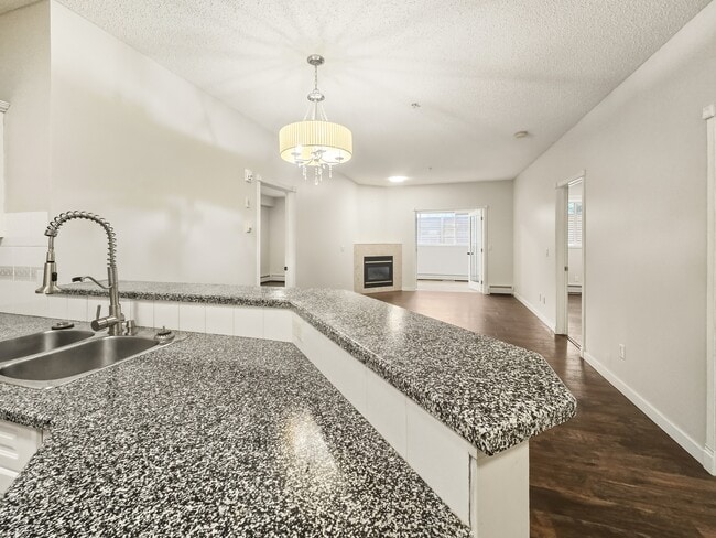 Photo du bâtiment - 126-114 14 Ave SW