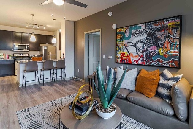 Signature-1505-Apartments-Near-NC-State-Fully-Furnished-Living-Room-Vinyl-Flooring-Throughout - Signature 1505