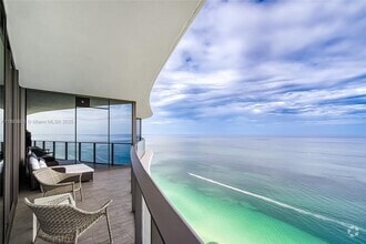 Building Photo - 15701 Collins Ave