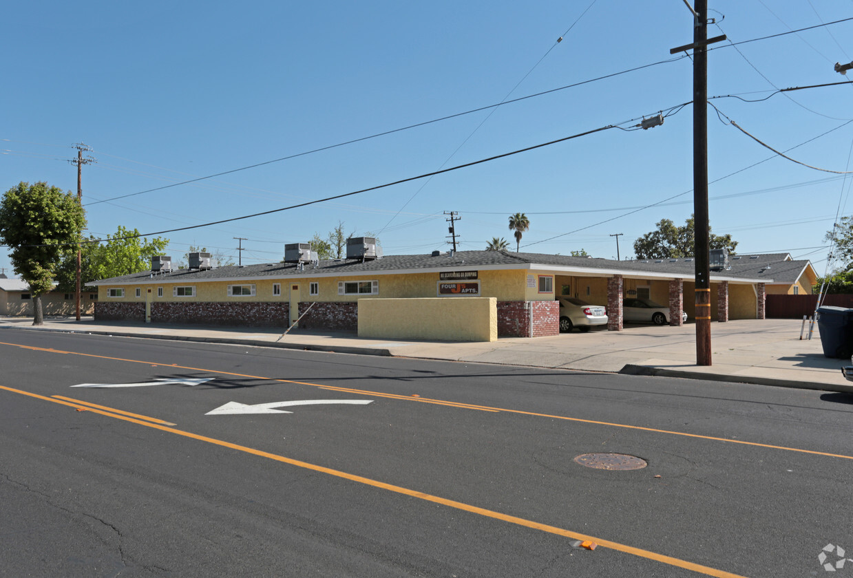 Building Photo - Four J Apartments