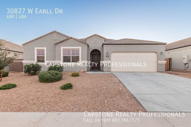 Foto del edificio - Uncover Your Ideal Residence: A 4-Bedroom ...