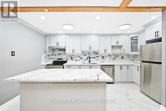 Building Photo - 4062-4062 Lawrence Ave E