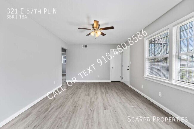 Foto del edificio - 321 E 57th Pl N