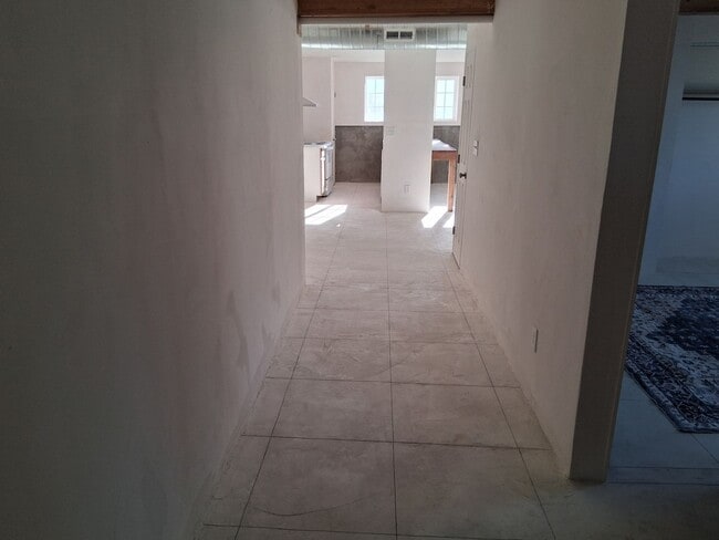 Building Photo - Large duplex with 3 car garage and made for blue collar folks.