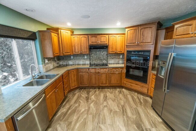 Building Photo - 6415 S Woodland Ct