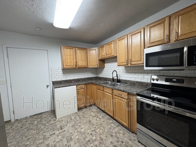 Building Photo - 5757 Antoinette Ln
