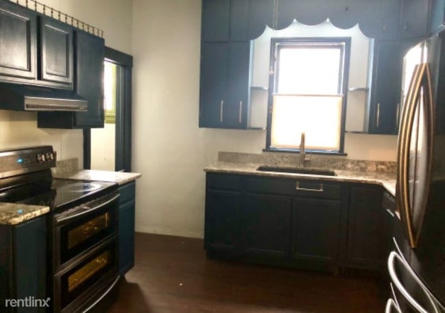 Building Photo - 4 br, 1 bath House - 110 1st Street