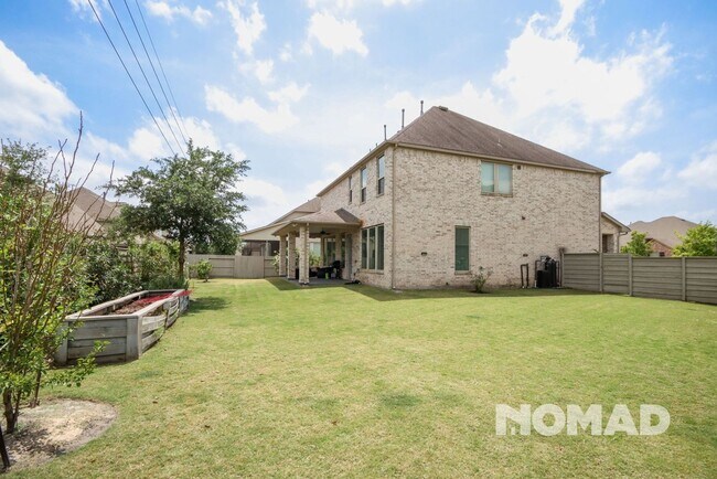 Foto del edificio - Spacious 4BA House in Manvel
