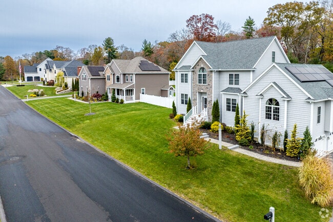 A row of newly built, contemporary homes in the North Tewksbury neighborhood.