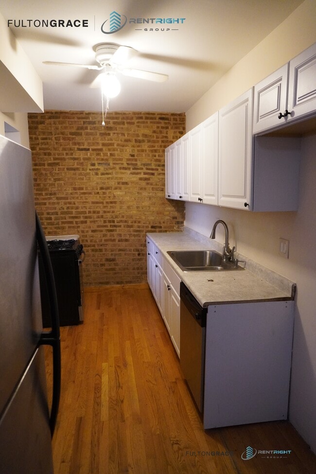 Building Photo - 1259 W Devon Ave