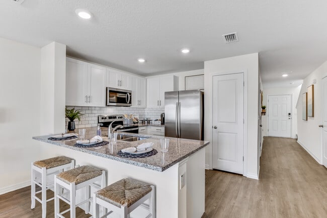 Building Photo - Laurel Lakes Townhomes