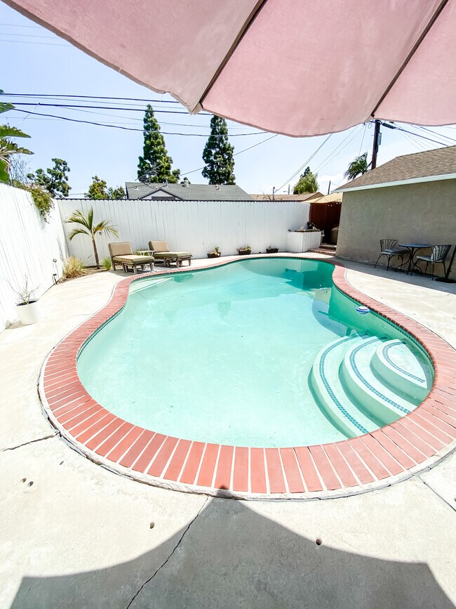 Swimming Pool with Privacy Fence - 15516 Florwood Ave