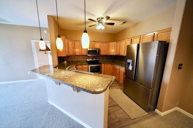 Building Photo - Modern 3-Bedroom Condo with Elevator Acces...