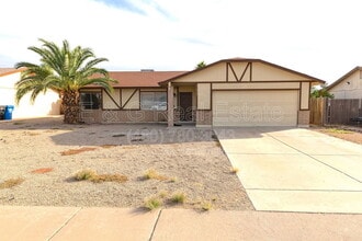 Building Photo - 10713 West Campbell Ave