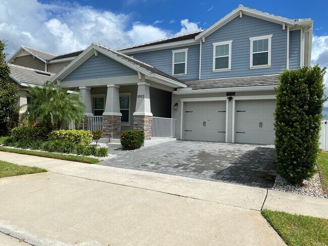 Foto del edificio - Spacious 5 Bedroom Pool Home with In-Law Suite in Lake Nona’s Coveted Storey Park!