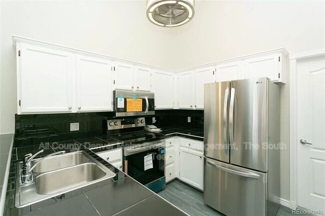 Building Photo - 9617 W Chatfield Ave
