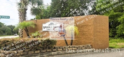 Building Photo - 5900 Village Cir N