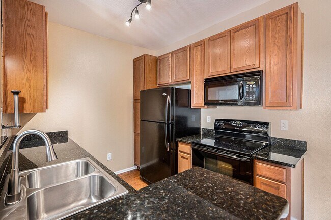 Building Photo - Two Bedroom Condo with Private Garage