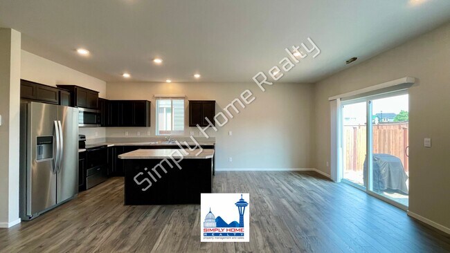 Foto del edificio - Welcome to Your 4-Bedroom Dream Home in Puyallup!