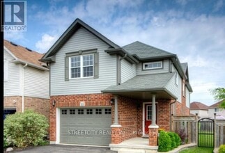 Building Photo - 200 Purple Sage Crescent