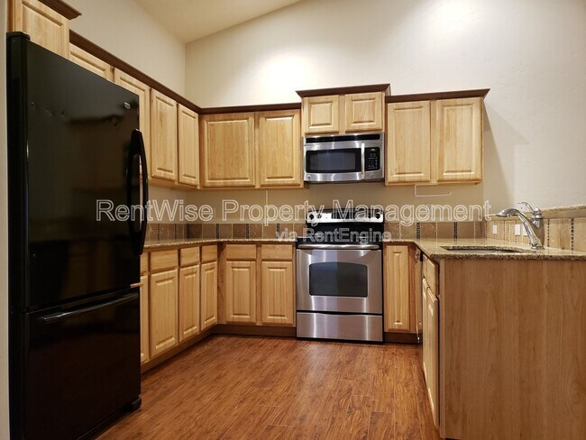 Building Photo - 6260 N Maximus Pl