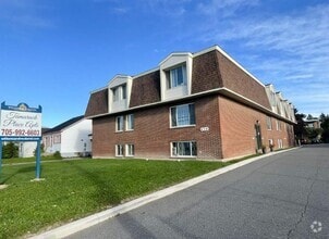 Building Photo - Tamarack Place Apartments