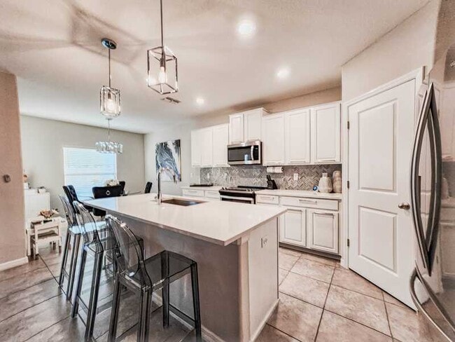 Foto del edificio - 7409 French Marigold Ave.