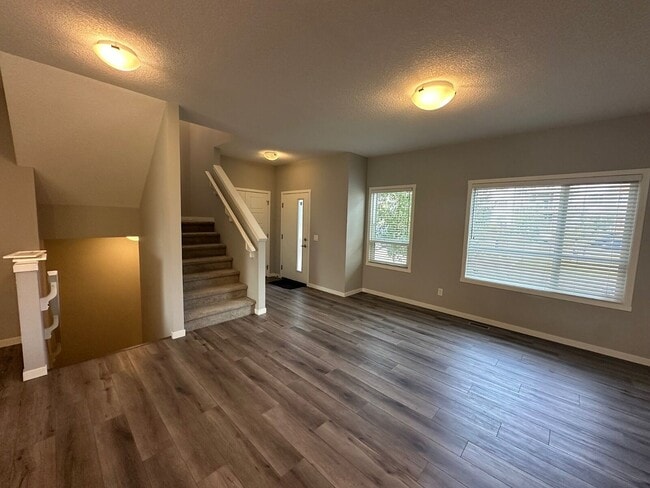 Building Photo - Stylish 3-Bedroom Townhouse in Harvest Hills – Perfect for Family Living (IP009)